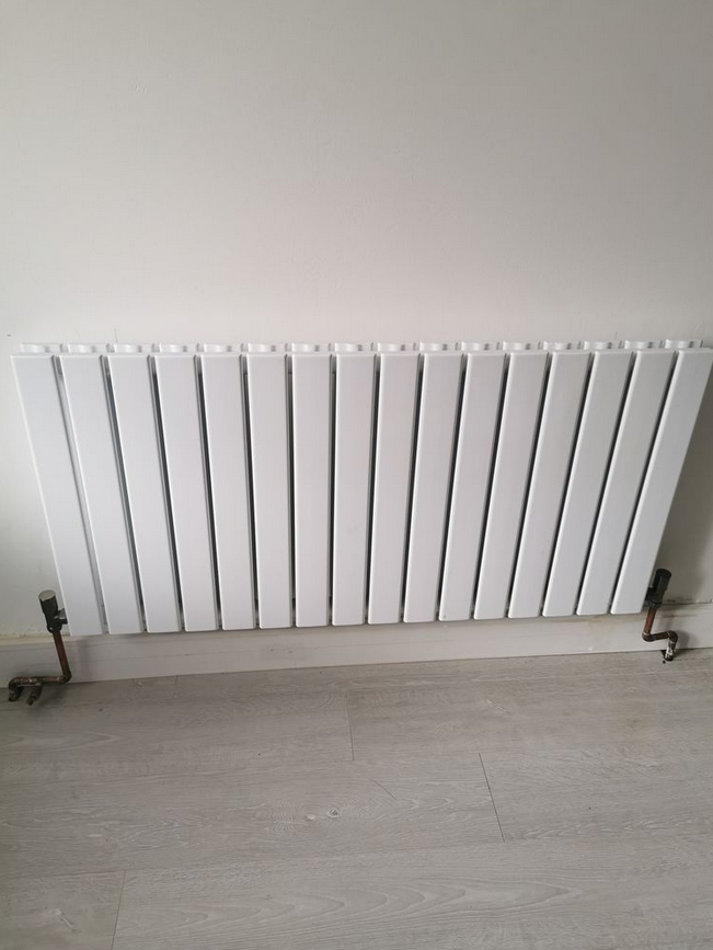 Premium designer radiator installation by TML Plumbing